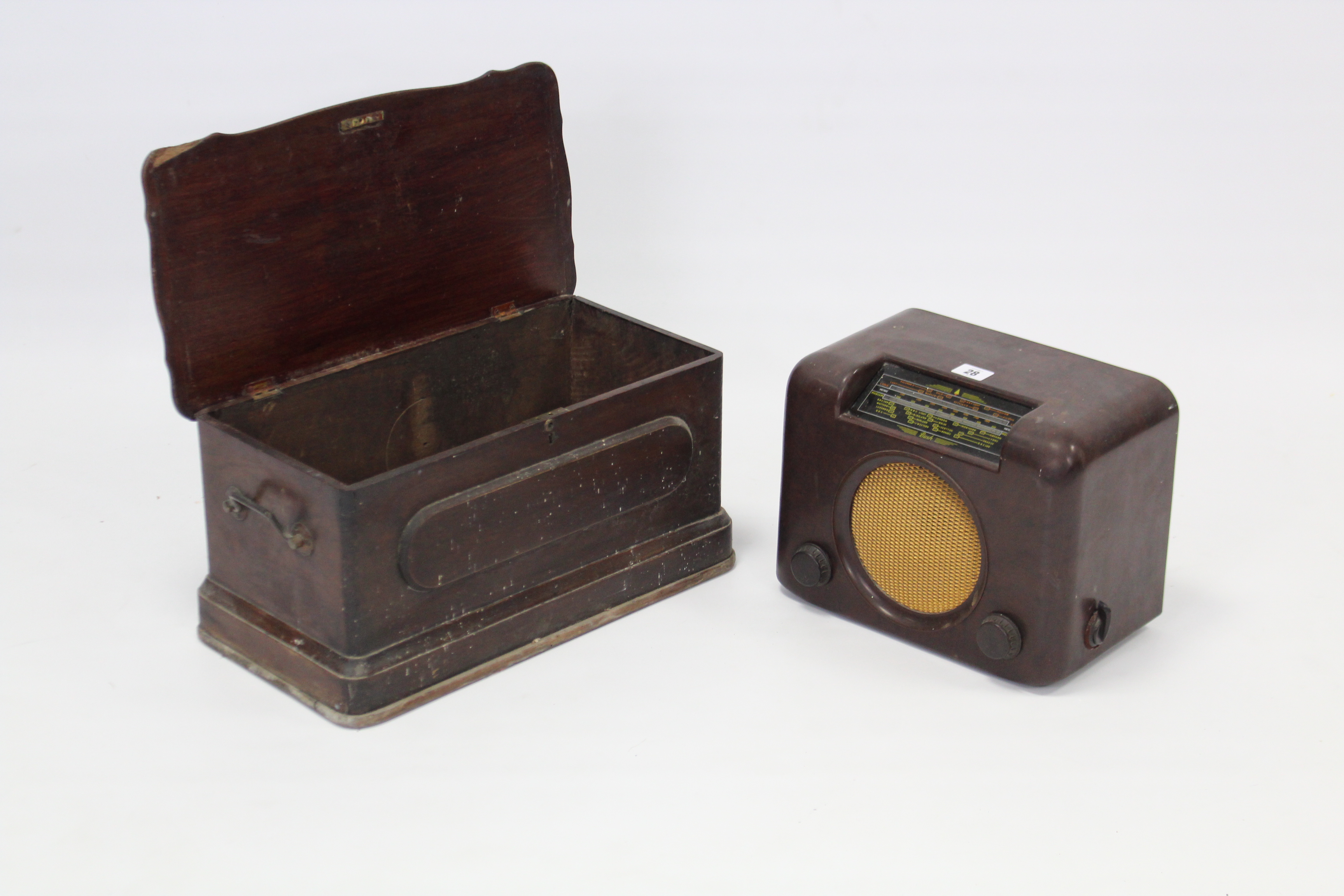 A Bush valve radio (Type DAC 90A), in brown Bakelite case; & a mahogany sewing machine case.