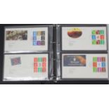 A collection of thirty two Royal Mail “Prestige Booklet” First Day covers. (one album).