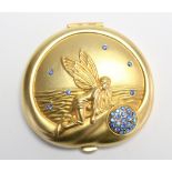 An Estee Lauder Pisces “Lucidity” gilt-metal compact, with pouch.