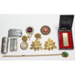 Four various cigarette lighters; & various items of costume jewellery.