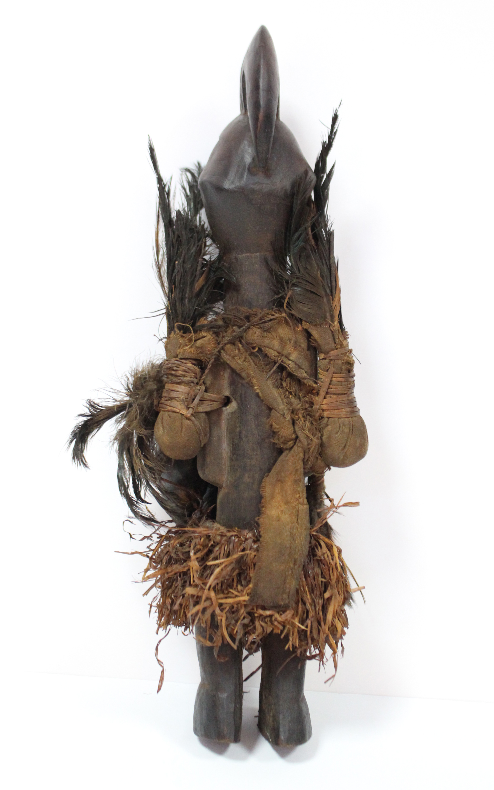 A Teke fetish figure with speer-shaped head-piece & scarified face, pouches of feathers either side, - Image 4 of 4