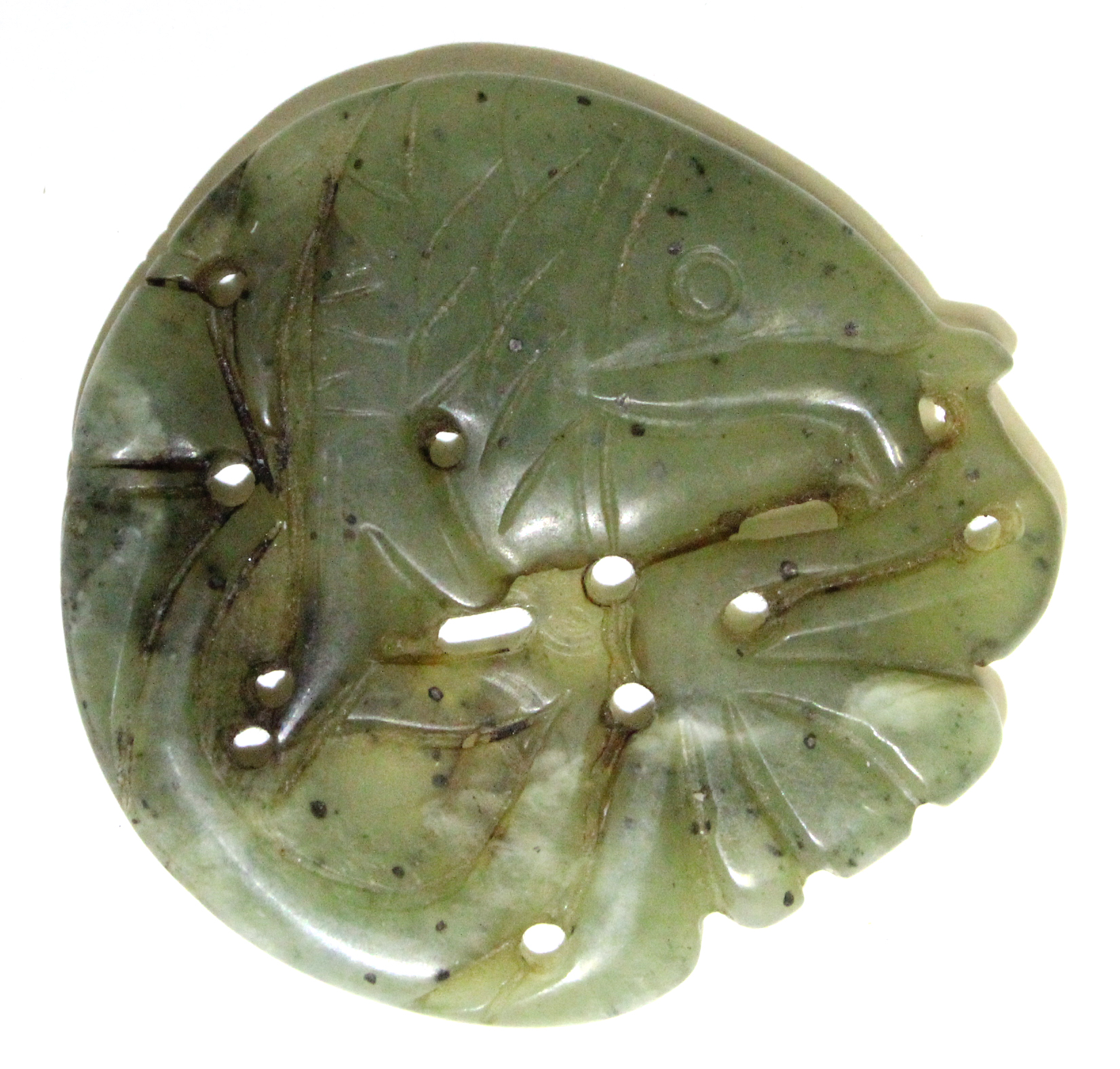 A Chinese carved & pierced jade roundel in the form of a fish amongst fronds; 2” wide. - Image 2 of 2