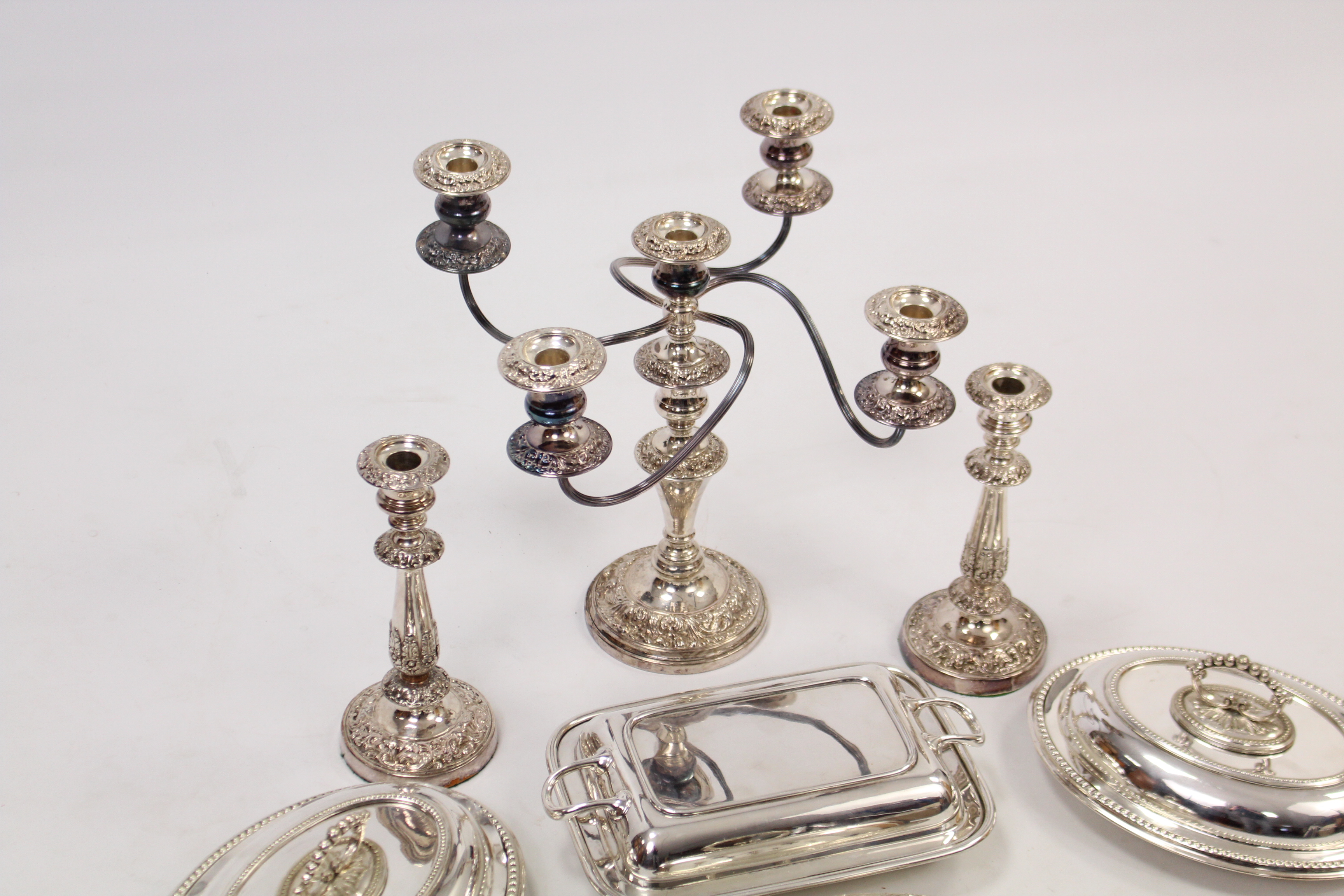 A silver plated four-branch table candelabra, 13½” high; a ditto pair of candlesticks, 9” high; & - Image 2 of 2