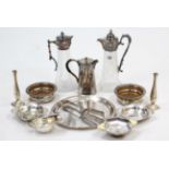 Two cut-glass claret jugs, each with silver plated mounts; a pair of silver plated coasters; a