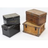 A grained tin travelling trunk with hinged lift-lid, 20¼” wide; two japanned-metal trunks; & a