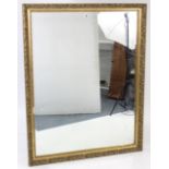 A large gilt-frame rectangular wall mirror inset bevelled plate, 50½” x 39”.