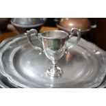 A silver two-handled trophy cup, 3½” high; & various items of platedware & metalware.