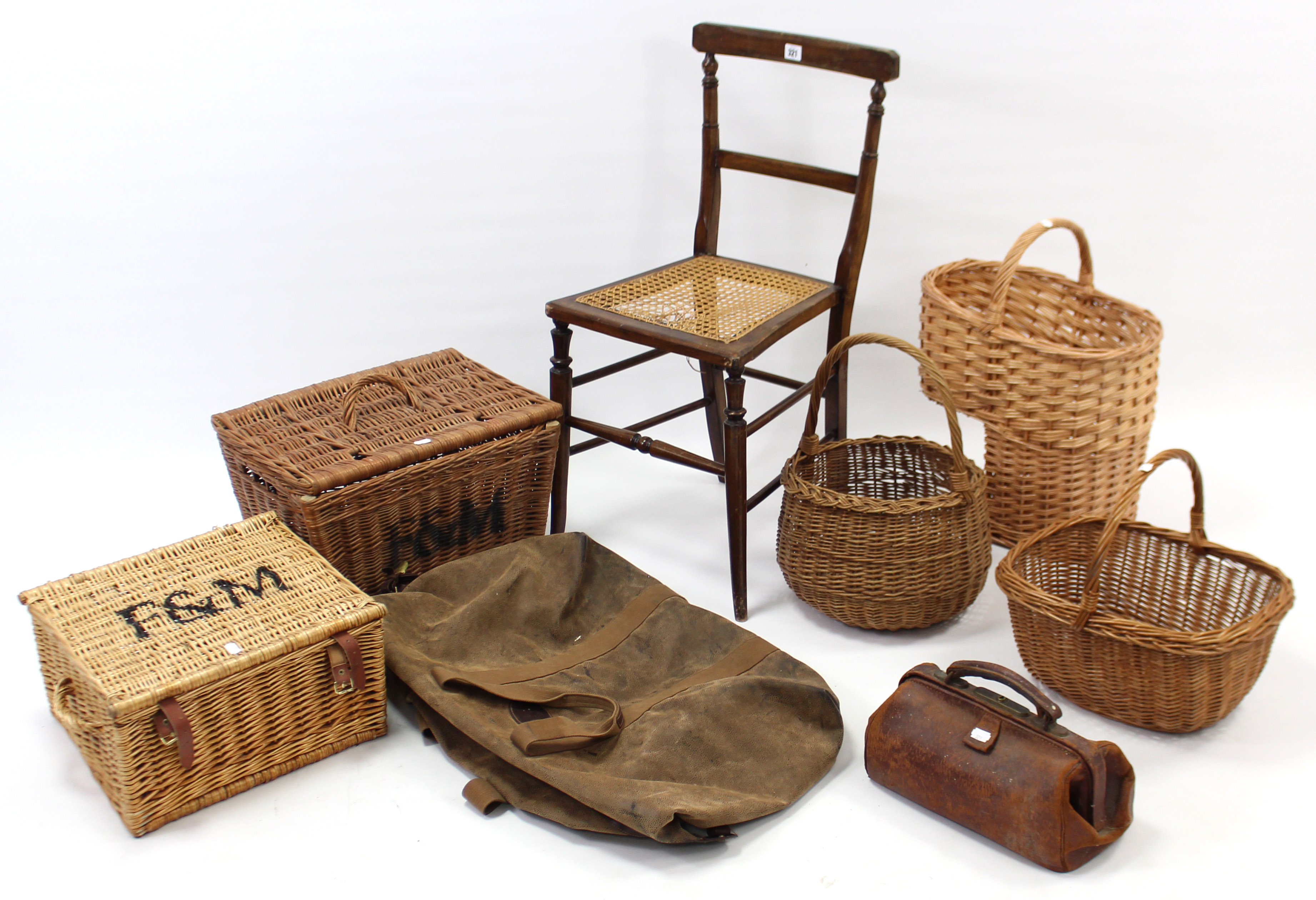 A leather small Gladstone-type bag; a holdall; fiver various wicker baskets & hampers; & an