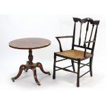 A mahogany tripod table with circular top, & on vase-turned centre column & four cabriole legs