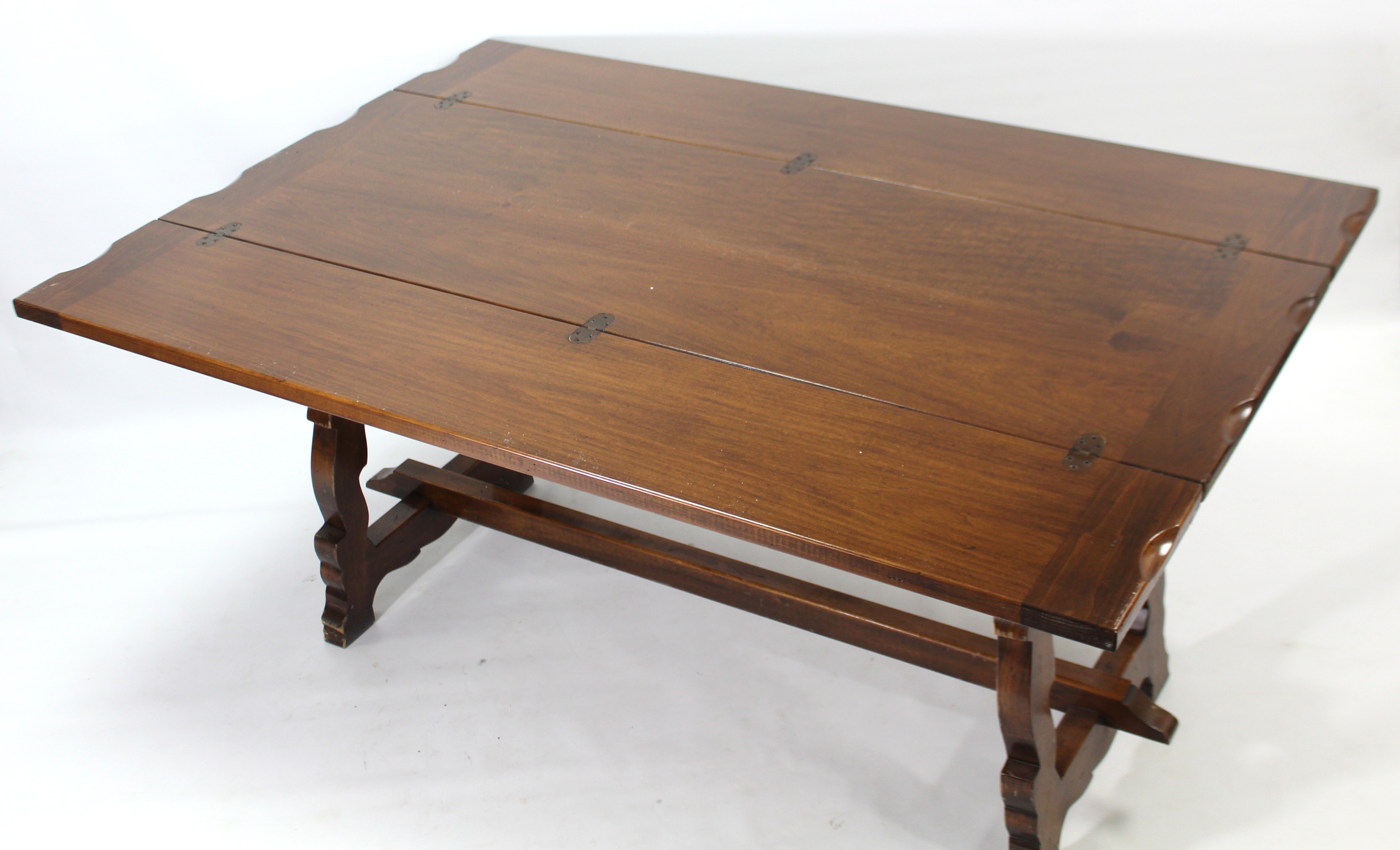 A mahogany finish dining table with rectangular fold-over top, & on shaped end supports joined by - Image 3 of 4