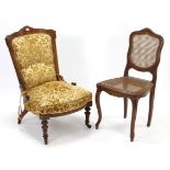 A Victorian inlaid-walnut frame nursing chair with padded back & sprung seat upholstered old gold