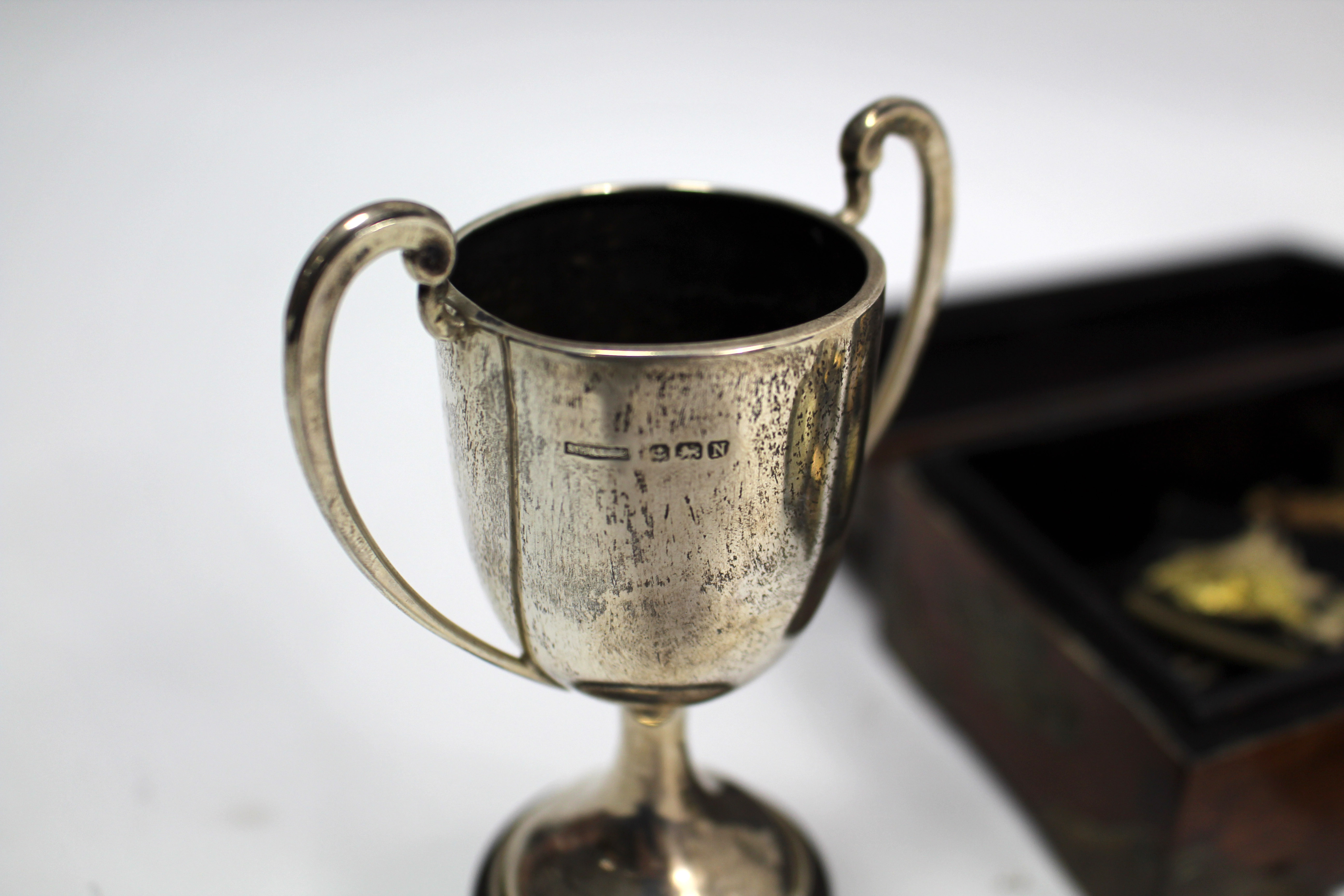 Two silver two-handled trophy cups; a pair of brass opera glasses; various military tunic - Image 4 of 4