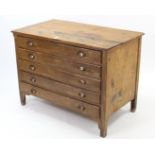 An early-mid 20th century pine & plywood plan-chest, fitted five long drawers with brass cup