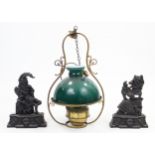 A pair of Victorian-style black painted cast-iron “Punch” & “Judy” door stops, 13½” high; & a