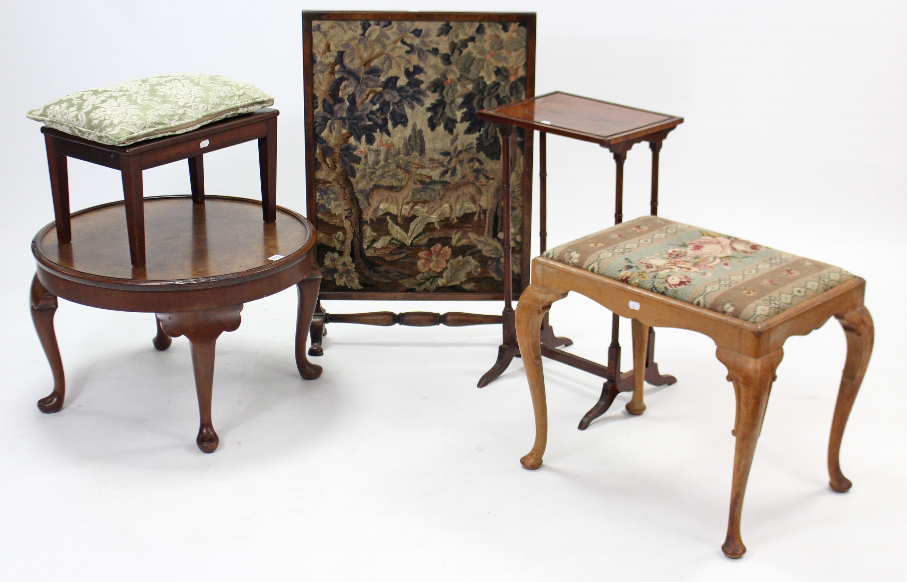 A mahogany circular low coffee table on four short cabriole legs & pad feet, 24” diam.; together