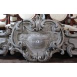 A late 19th century large light-grey painted & carved wooden overmantel panel with scroll border, 8’