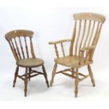 A Victorian beech lath-back elbow chair with hard seat, & on turned legs with turned stretchers; & a