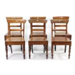 A set of six early 20th century cottage bow-back dining chairs with hard seats, & on turned