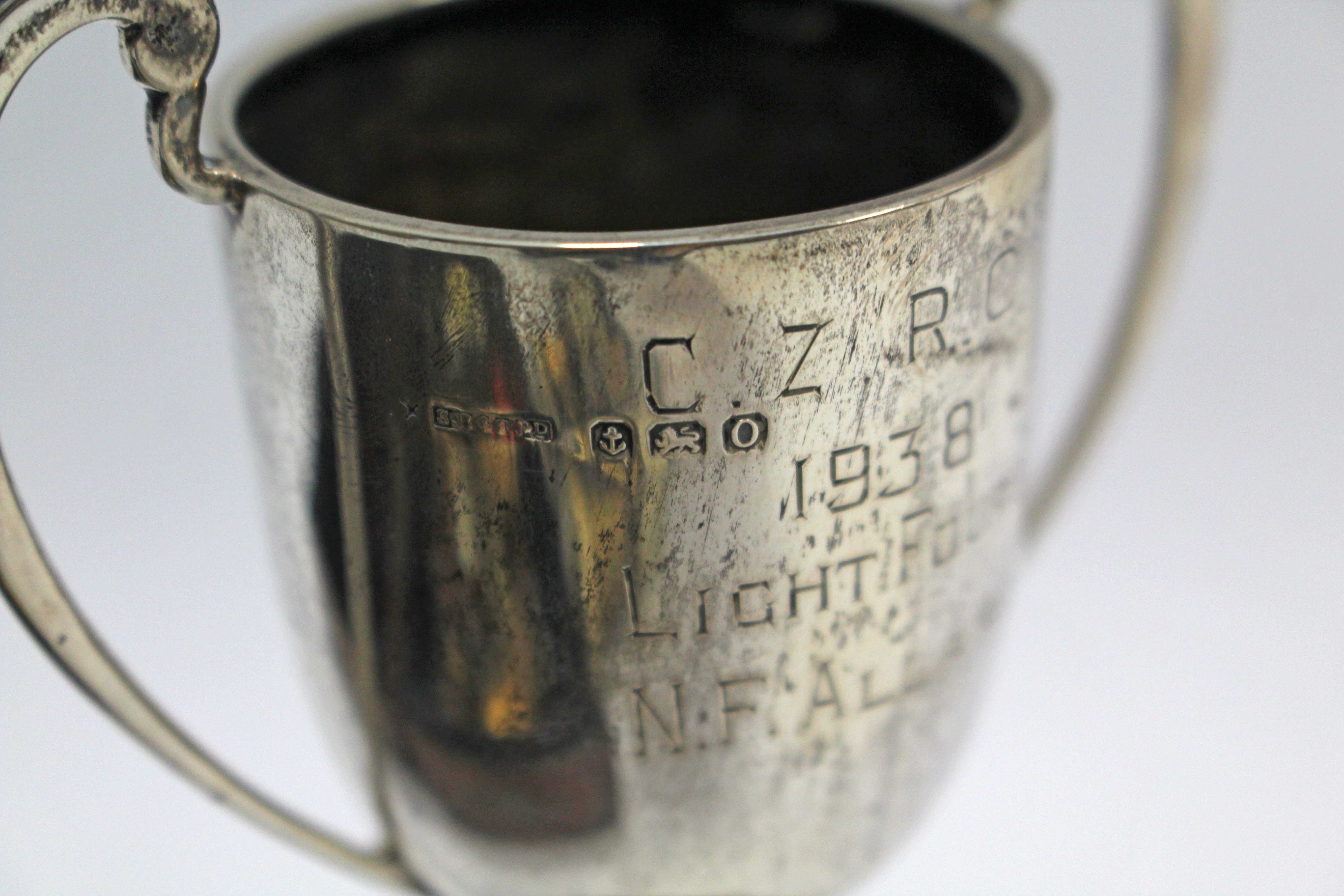 Two silver two-handled trophy cups; a pair of brass opera glasses; various military tunic - Image 3 of 4