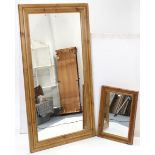 Two pine frame rectangular wall mirrors, 54” x 30” & 21” x 15½”.