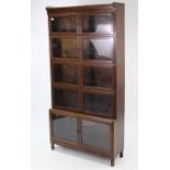 A Globe Wernicke-type tall open five-tier sectional bookcase, each tier enclosed by pair of glazed