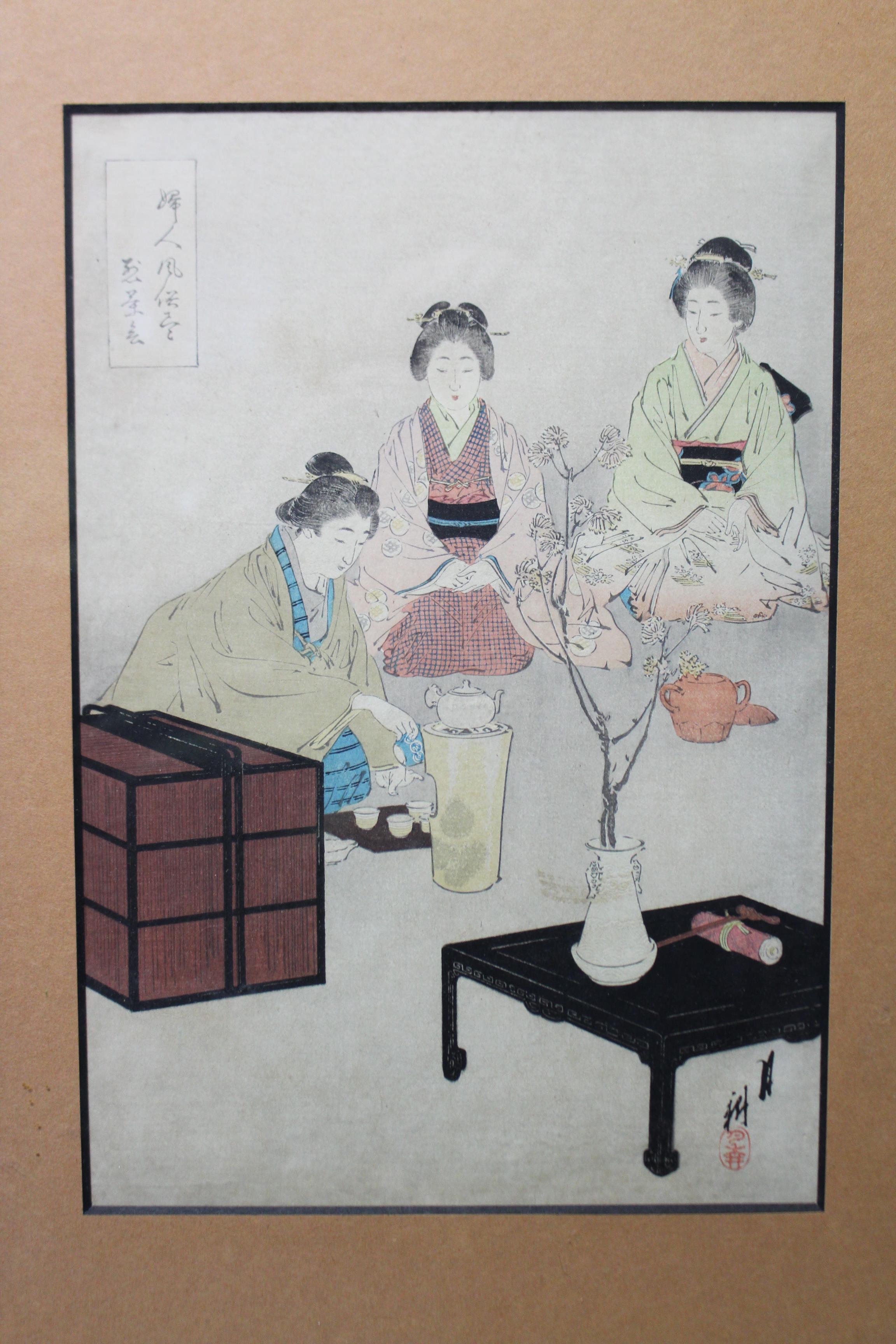 A Japanese coloured woodcut depicting a figure scene, 12½” x 8½”; together with a glass five-