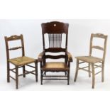 A late 19th/early 20th century carved beech spindle back elbow chair inset woven-cane seat, & on