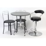 A silvered-metal frame kitchen table with marble-effect circular top, 27½” diam.; & a matching