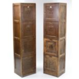 A pair of plywood tall lockers, each enclosed by four panel doors, 15¾” wide x 64¾” high.