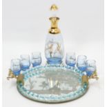 A Venetian-style mirrored circular two-handled tea tray, 10¼” diam.; a glass decanter; & a ditto set