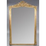 A Victorian large rectangular pier glass with shaped top, in carved & pierced giltwood & gesso frame