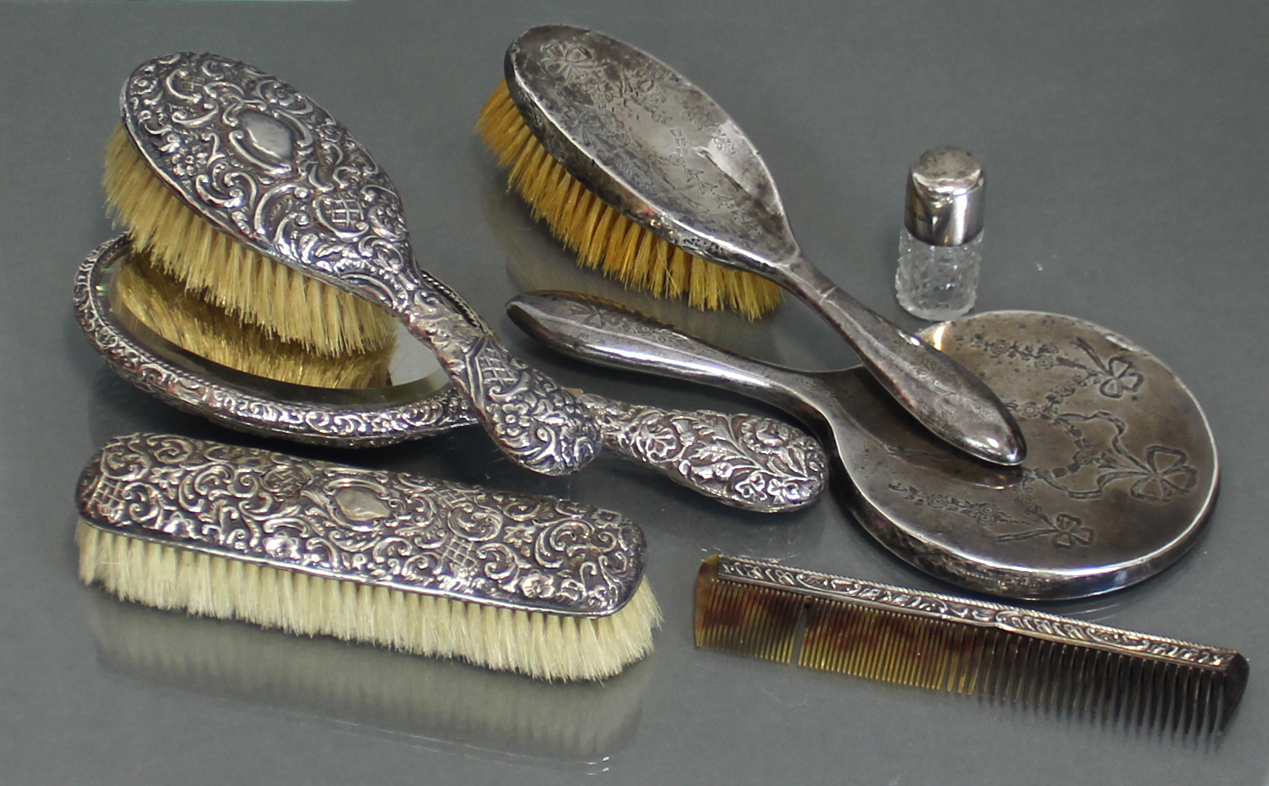 A silver-backed hair brush & matching clothes brush, Birmingham 1899 by Matthew John Jessop; a