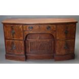 A LATE 18th century MAHOGANY BOW-FRONT SIDEBOARD, fitted central frieze drawer above an arched apron