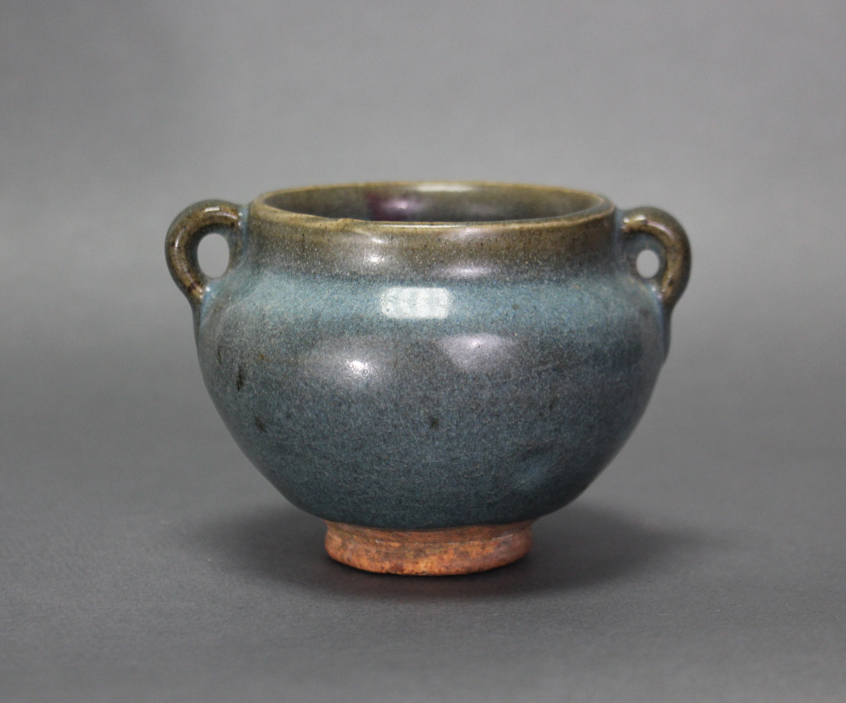 A Chinese Junyao-type pottery jarlet of compressed round form with small ring side-handles, a purple - Image 2 of 5