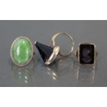 Two 9ct. gold gem-set rings; & a signet ring, the carnelian matrix with engraved intaglio bust of an