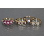 Three various 9ct. gold gem-set rings; & a simulated diamond solitaire.