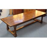 A LARGE 17th century STYLE OAK REFECTORY TABLE, the plain rectangular top with cleated ends above