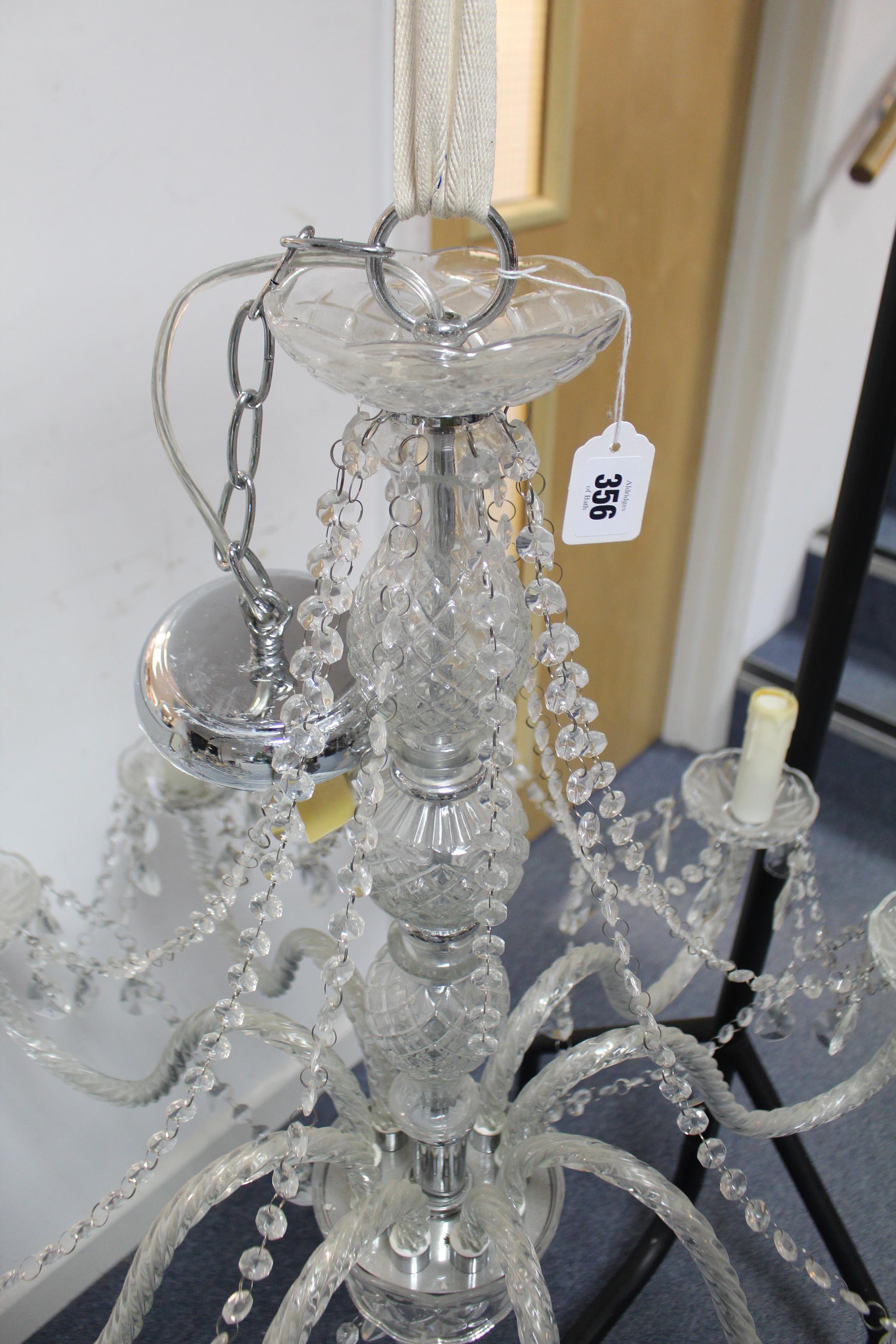 A cut-glass nine branch chandelier, with central baluster column & scroll arms, hung with beads & - Image 3 of 3