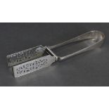 A pair of Victorian silver serving tongs with pierced rectangular blades, 10” long; London 1893,