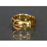 A Victorian 18ct. gold belt buckle ring, London hallmarks for 1882; size: M. (7.1gm).
