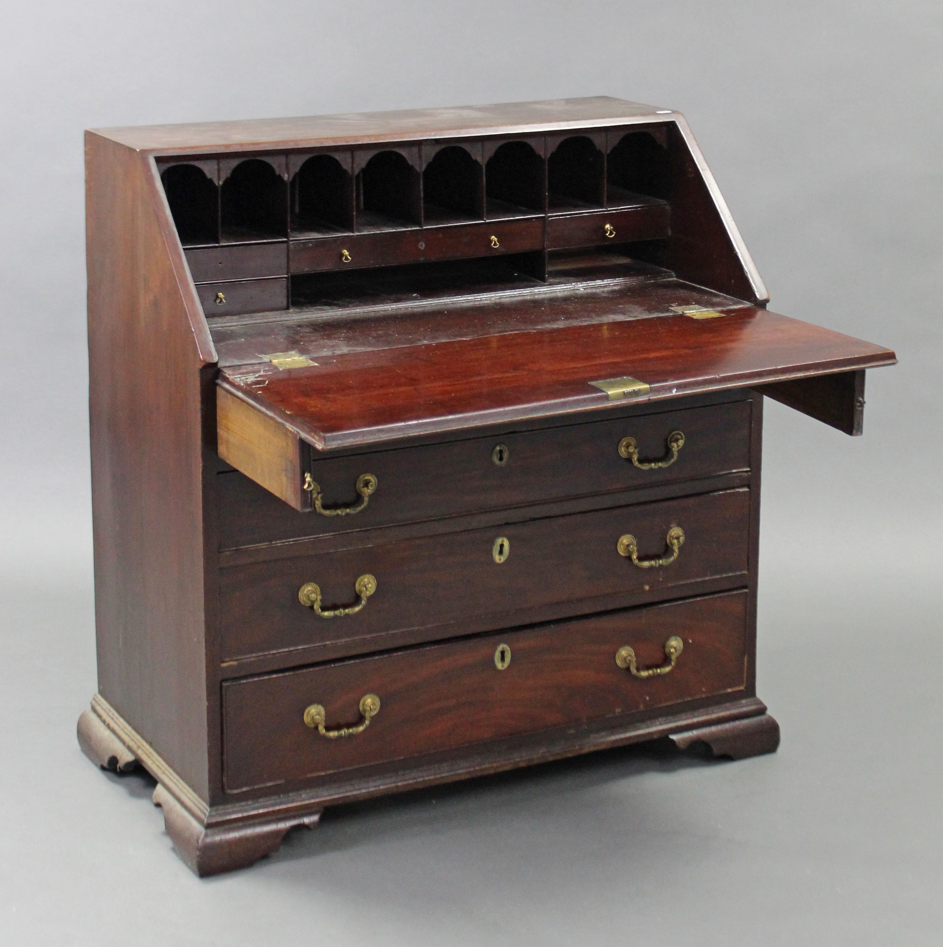 A late 18th century mahogany bureau, the fitted interior enclosed by sloping fall-front above four - Image 2 of 2