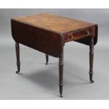 A Georgian mahogany rectangular drop-leaf table fitted drawer to one end with brass knob handles, on