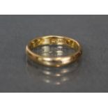 A 22ct. gold wedding band, London hallmarks for 1919; size: U. (7.5gm).