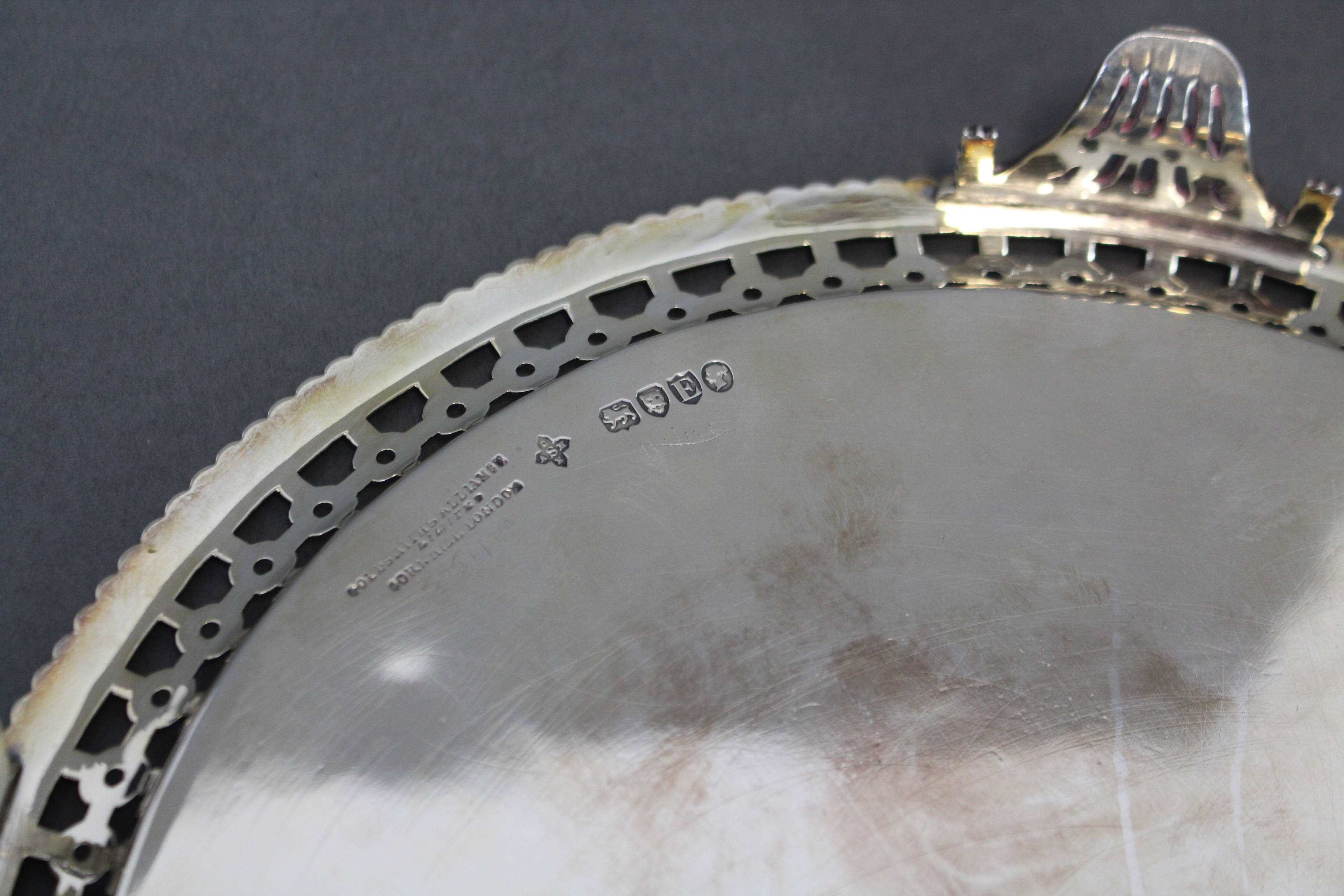 A Victorian silver circular tray with engraved floral decoration, the pierced border with - Image 3 of 3