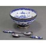 A Royal Worcester blue & white large bowl with Chinoiserie landscape decoration & floral fish-