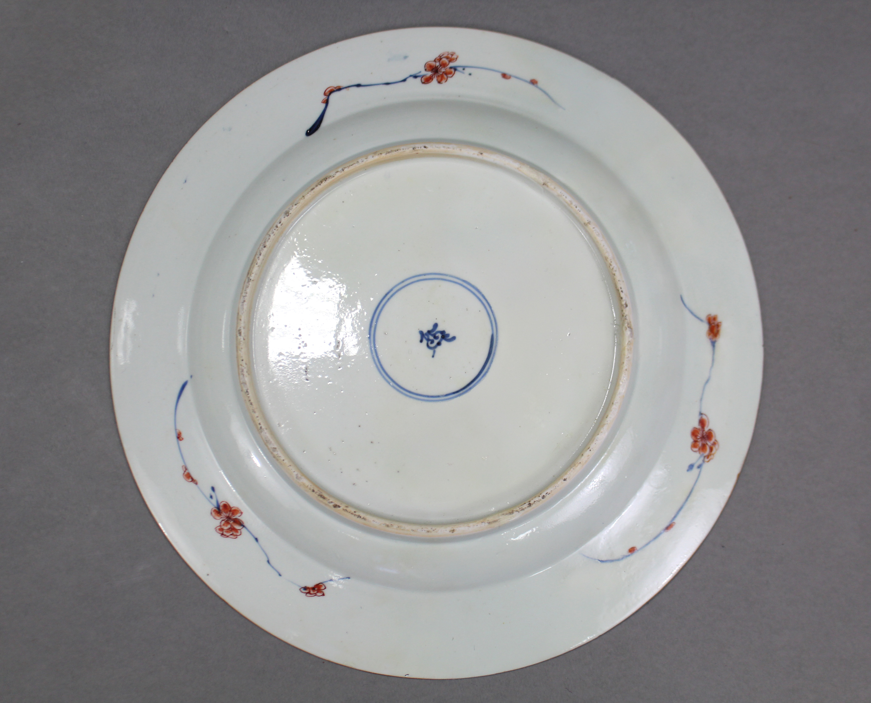 An 18th century Chinese Imari porcelain charger, the centre with landscape decoration & stylised - Image 2 of 2
