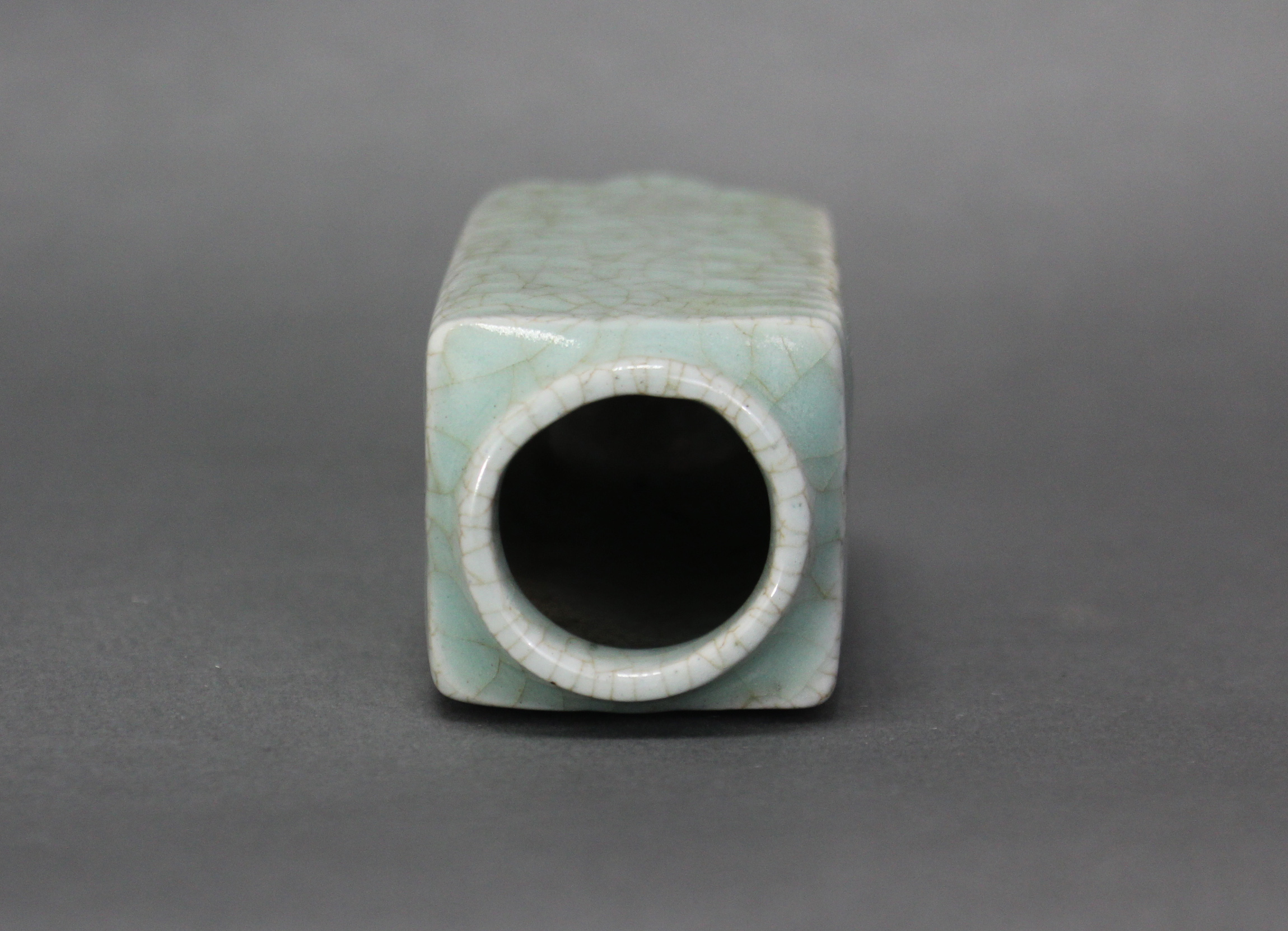 A Chinese porcelain guan-type cong-shaped vase with moulded corners, & pale green crackled glaze; 4” - Image 3 of 4