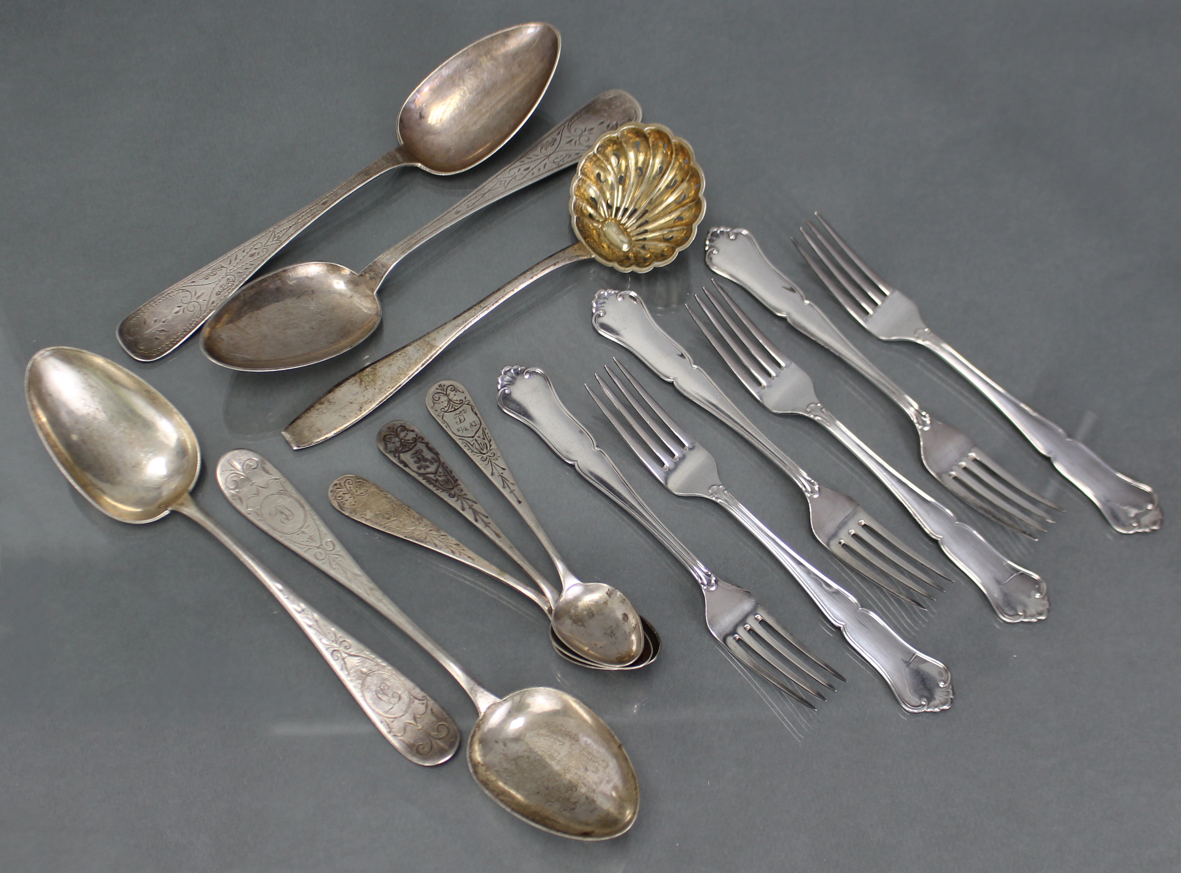 A Finnish silver sifter ladle; six ditto dessert forks; & four 19th century Norwegian table