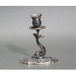 A Frederico Buccellati .925 standard silver candlestick, the stem modelled as a fish, with foliate