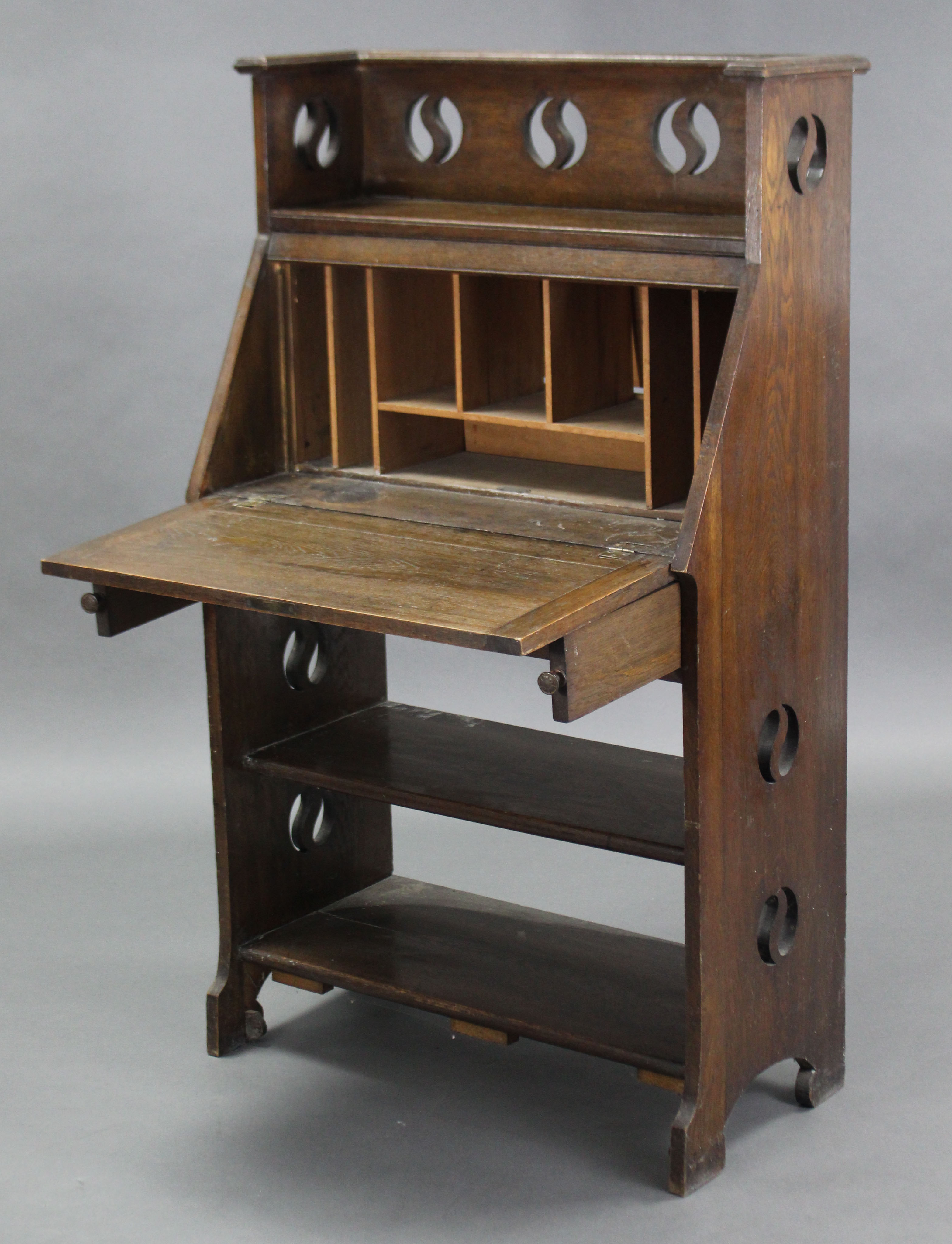 An Arts & Crafts oak upright hall cabinet, with pierced roundels to the tray top & sides, a - Image 4 of 6